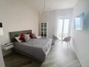 Stanza fronte mare con balcone